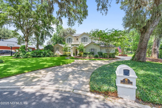 312 Bartram Trl, Saint Johns, FL 32259 - view of front of home with a front yard and stucco siding