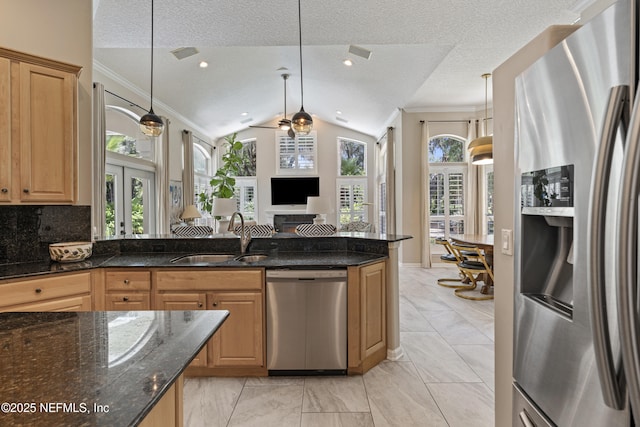 312 Bartram Trl, Saint Johns, FL 32259 - kitchen with stainless steel appliances, crown molding, pendant lighting, dark stone countertops, and french doors