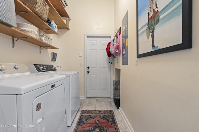 312 Bartram Trl, Saint Johns, FL 32259 - laundry area featuring washer and dryer and baseboards