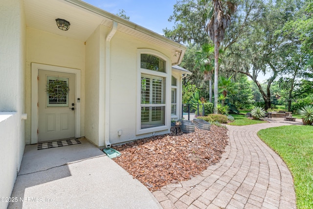 312 Bartram Trl, Saint Johns, FL 32259 - doorway to property featuring stucco siding