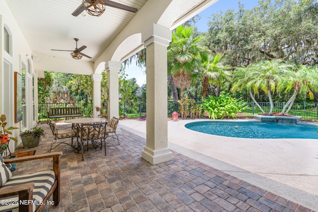 312 Bartram Trl, Saint Johns, FL 32259 - fenced backyard with ceiling fan, a patio area, and outdoor dining area