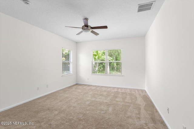 336 Edge Of Woods Rd, Saint Augustine, FL 32092 - carpeted spare room featuring ceiling fan, a textured ceiling, and a smoke detector