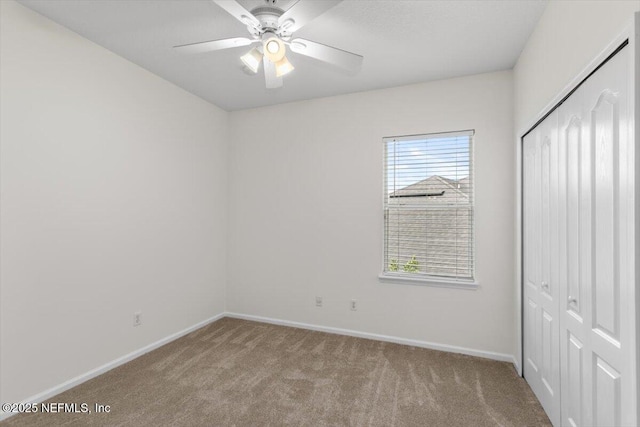 336 Edge Of Woods Rd, Saint Augustine, FL 32092 - unfurnished bedroom with a closet, carpet, and a ceiling fan