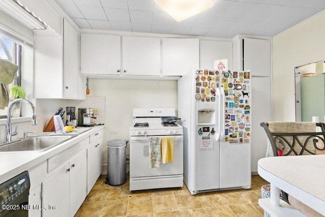 2305 Broward Rd, Jacksonville, FL 32218 - kitchen featuring white appliances, white cabinets, and light countertops