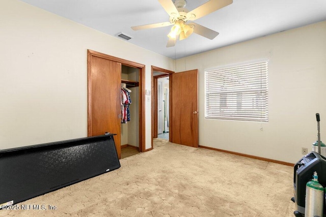 2305 Broward Rd, Jacksonville, FL 32218 - carpeted bedroom with a closet and a ceiling fan