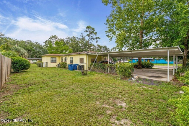 2305 Broward Rd, Jacksonville, FL 32218 - back of property featuring a carport