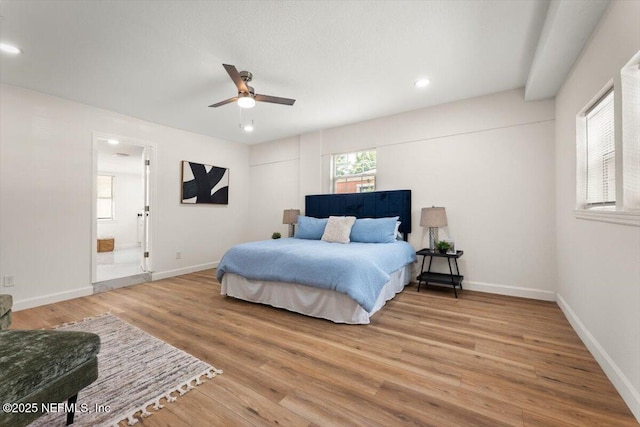 8940 Monroe Ave, Jacksonville, FL 32208 - bedroom featuring wood finished floors, recessed lighting, a ceiling fan, and ensuite bath