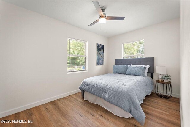 8940 Monroe Ave, Jacksonville, FL 32208 - bedroom with wood finished floors and a ceiling fan
