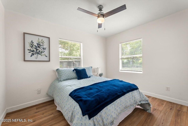 8940 Monroe Ave, Jacksonville, FL 32208 - bedroom with wood finished floors and ceiling fan