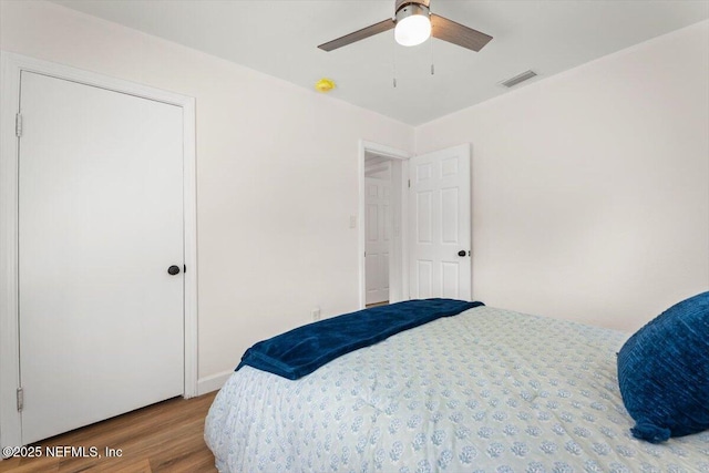 8940 Monroe Ave, Jacksonville, FL 32208 - bedroom featuring wood finished floors and ceiling fan