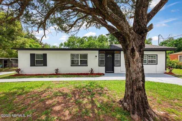 8940 Monroe Ave, Jacksonville, FL 32208 - single story home with a front lawn