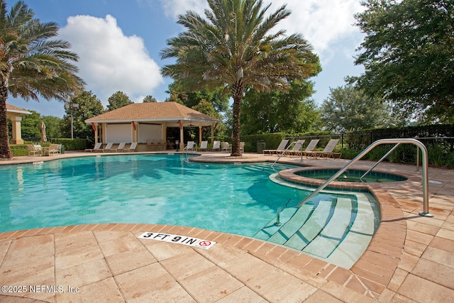 16 Village View Way, Palm Coast, FL 32137 - community pool featuring a community hot tub and a patio
