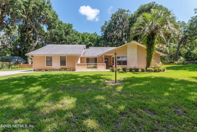 835 Fountain Dr, Fernandina Beach, FL 32034 - view of front of home with a front yard