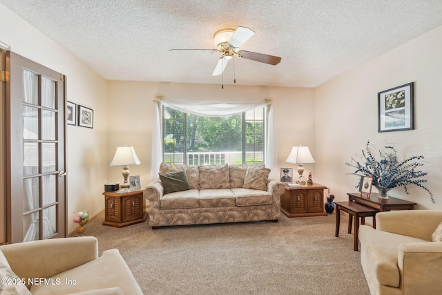 835 Fountain Dr, Fernandina Beach, FL 32034 - living area featuring light carpet, a ceiling fan, and a textured ceiling
