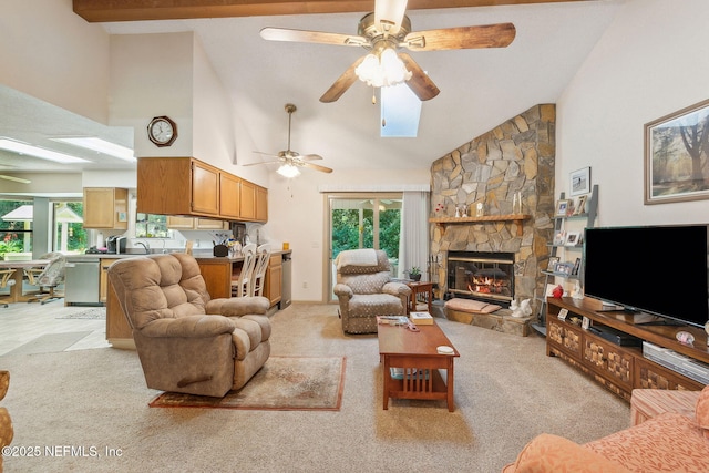 835 Fountain Dr, Fernandina Beach, FL 32034 - living area featuring high vaulted ceiling, ceiling fan, light colored carpet, and a fireplace