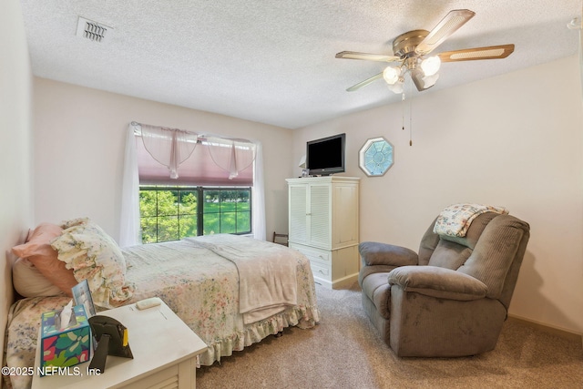 835 Fountain Dr, Fernandina Beach, FL 32034 - bedroom with carpet, a textured ceiling, and ceiling fan