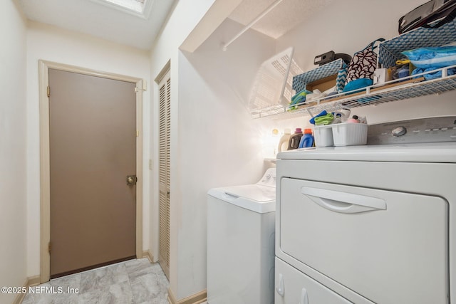 835 Fountain Dr, Fernandina Beach, FL 32034 - laundry area with separate washer and dryer and light marble finish floors