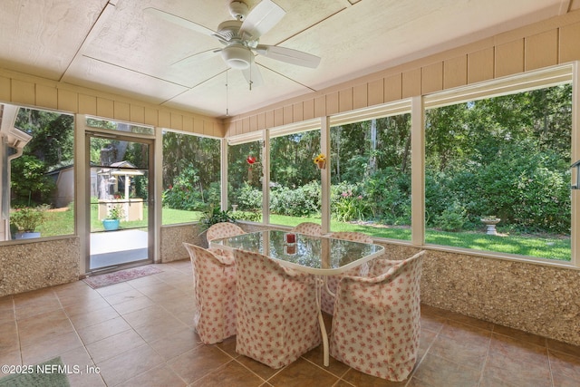 835 Fountain Dr, Fernandina Beach, FL 32034 - sunroom featuring ceiling fan, plenty of natural light, and outdoor dining space