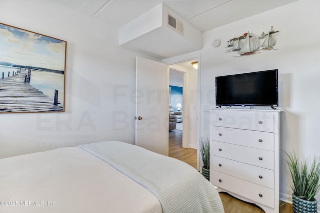 3350 S Fletcher Ave Unit C5, Fernandina Beach, FL 32034 - bedroom with light wood finished floors