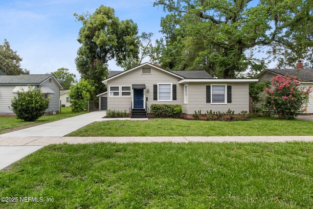 4723 Sunderland Rd, Jacksonville, FL 32210 - view of front of home with a front yard