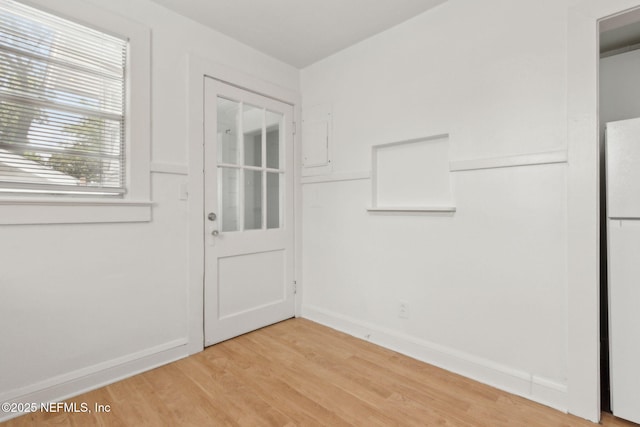 4723 Sunderland Rd, Jacksonville, FL 32210 - doorway with light wood-style flooring and baseboards