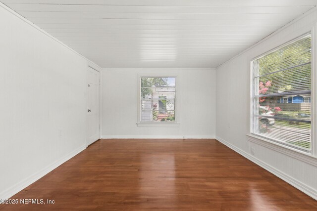 4723 Sunderland Rd, Jacksonville, FL 32210 - spare room with plenty of natural light and wood finished floors