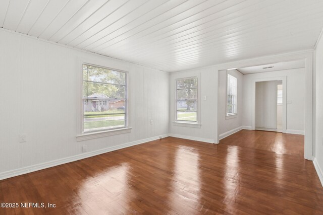 4723 Sunderland Rd, Jacksonville, FL 32210 - spare room featuring healthy amount of natural light and wood finished floors