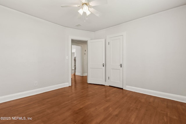 4723 Sunderland Rd, Jacksonville, FL 32210 - empty room with ceiling fan, wood finished floors, and ornamental molding