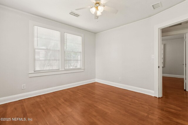 4723 Sunderland Rd, Jacksonville, FL 32210 - empty room featuring ceiling fan, ornamental molding, and wood finished floors