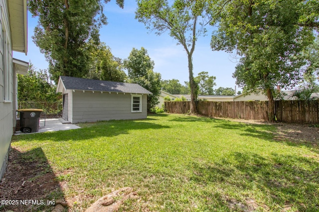 4723 Sunderland Rd, Jacksonville, FL 32210 - fenced backyard featuring an outbuilding and a patio area
