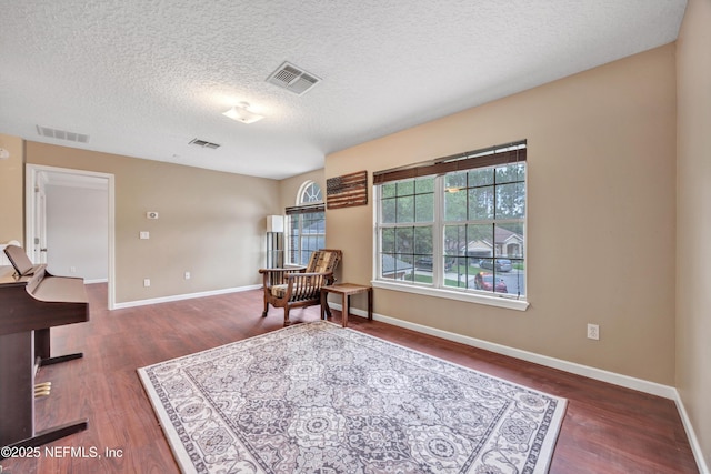 2502 Willow Creek Dr, Fleming Island, FL 32003 - sitting room with wood finished floors and a textured ceiling