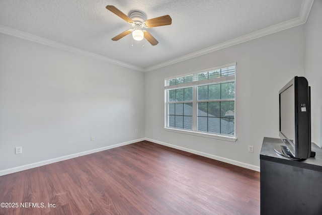 2502 Willow Creek Dr, Fleming Island, FL 32003 - unfurnished living room featuring dark wood-style flooring, a ceiling fan, ornamental molding, and a textured ceiling
