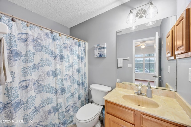 2502 Willow Creek Dr, Fleming Island, FL 32003 - full bath with vanity, a textured ceiling, a ceiling fan, and a shower with shower curtain