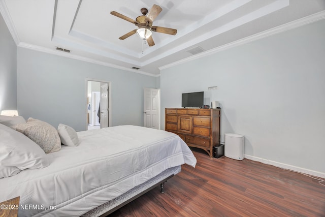 2502 Willow Creek Dr, Fleming Island, FL 32003 - bedroom with a raised ceiling, wood finished floors, ornamental molding, and a ceiling fan