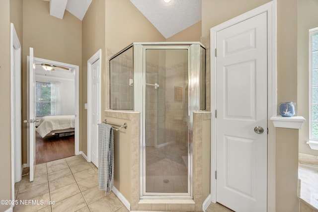 2502 Willow Creek Dr, Fleming Island, FL 32003 - full bathroom featuring a shower stall, vaulted ceiling, ensuite bath, and ceiling fan