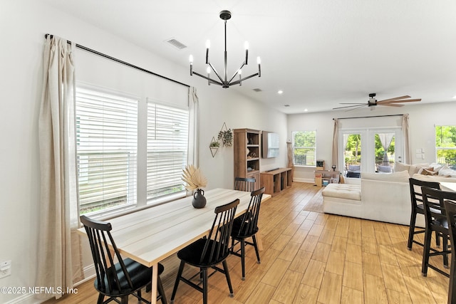 133 Wambaw Dr, Saint Johns, FL 32259 - dining room featuring light wood-style floors, a chandelier, recessed lighting, and ceiling fan