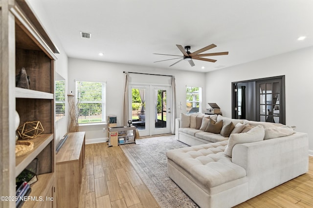 133 Wambaw Dr, Saint Johns, FL 32259 - living area with french doors, ceiling fan, recessed lighting, and light wood-style floors