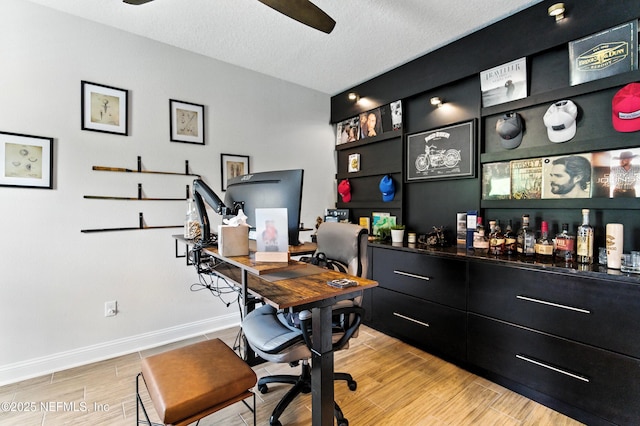 133 Wambaw Dr, Saint Johns, FL 32259 - office with light wood-type flooring, ceiling fan, a textured ceiling, and a dry bar
