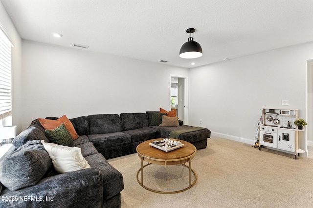 133 Wambaw Dr, Saint Johns, FL 32259 - carpeted living area with plenty of natural light and recessed lighting