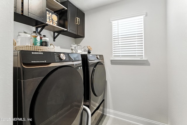 133 Wambaw Dr, Saint Johns, FL 32259 - laundry room with independent washer and dryer and cabinet space