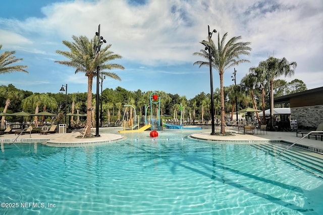 133 Wambaw Dr, Saint Johns, FL 32259 - community pool with a water slide and a patio