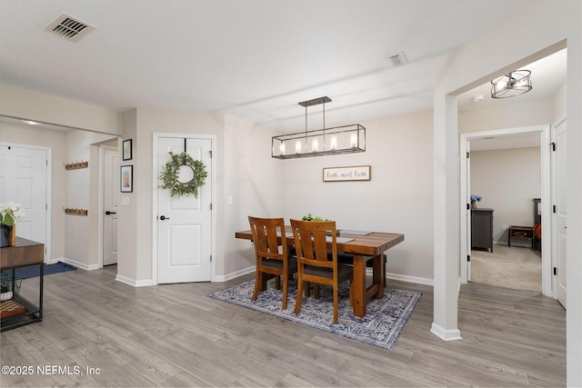 65 Birchfield Ln, Saint Augustine, FL 32092 - dining room with light wood finished floors and baseboards