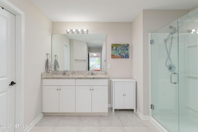 65 Birchfield Ln, Saint Augustine, FL 32092 - full bath with a stall shower, double vanity, and tile patterned floors
