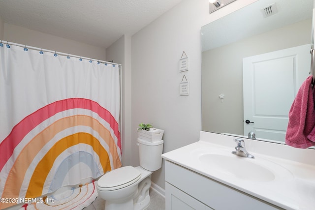 65 Birchfield Ln, Saint Augustine, FL 32092 - full bath featuring vanity, tile patterned flooring, a shower with curtain, and a textured ceiling