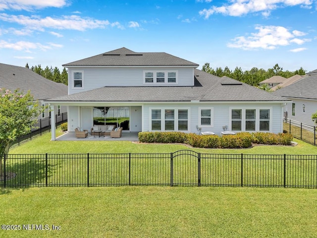 246 Glenneyre Cir, Saint Augustine, FL 32092 - back of property featuring an outdoor hangout area, a patio, a fenced backyard, and a shingled roof