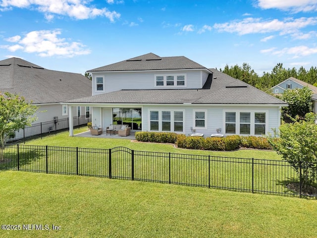 246 Glenneyre Cir, Saint Augustine, FL 32092 - back of house featuring an outdoor living space, a patio area, a fenced backyard, and roof with shingles