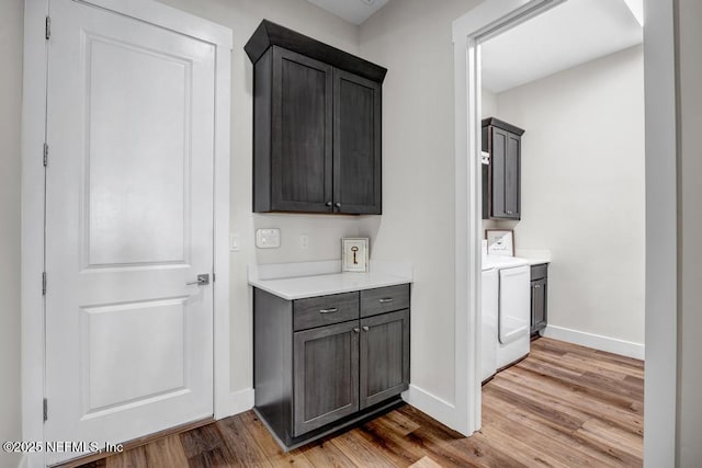 246 Glenneyre Cir, Saint Augustine, FL 32092 - bar featuring wood finished floors and baseboards