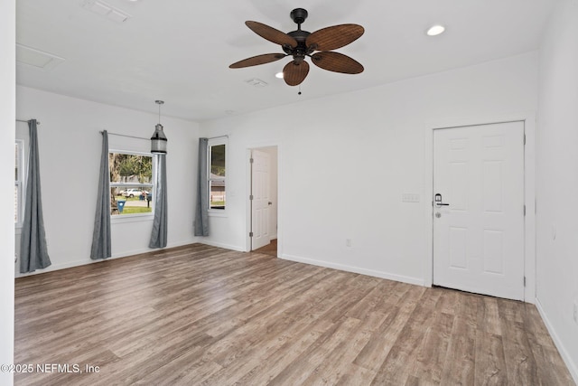 5834 Harris Ave, Jacksonville, FL 32211 - unfurnished living room with a ceiling fan, light wood-style floors, recessed lighting, and attic access