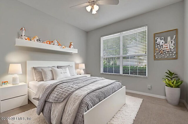 644 Casa Fuerta Ln, Saint Augustine, FL 32080 - carpeted bedroom with baseboards and ceiling fan