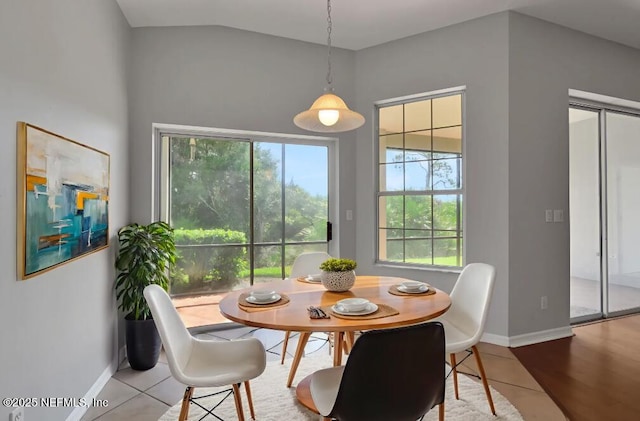 644 Casa Fuerta Ln, Saint Augustine, FL 32080 - tiled dining area with plenty of natural light and vaulted ceiling